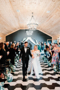 Dog-friendly wedding ceremony at The Black Barn in Florida with couple’s dog included officiated by Once Upon 2 Rings