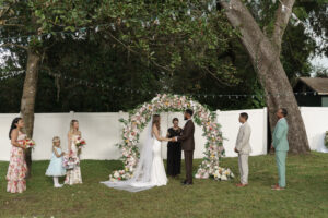 Garden wedding ceremony in Orlando Florida officiated by Karen Hooper with Once Upon 2 Rings