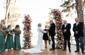Lakefront wedding ceremony at Venue at Gentry Pines in Florida officiated by Once Upon 2 Rings