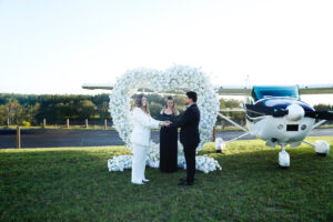 Wedding ceremony at Apopka airport Florida officiated by Karen Hooper of Once Upon 2 Rings