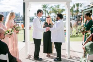 Same-sex wedding ceremony at Ulele in Tampa Florida officiated by Once Upon 2 Rings