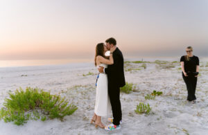 Sunset beach elopement ceremony in Clearwater Florida by Once Upon 2 Rings
