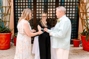 Outdoor intimate wedding ceremony at Disney Swan Hotel, West Courtyard Orlando