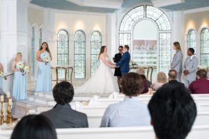 Wedding ceremony at Disney Wedding Pavilion in Orlando Florida officiated by Karen Hooper at Once Upon 2 Rings